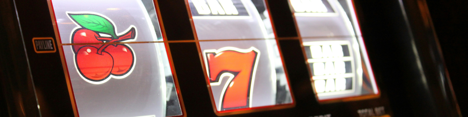 A picture of a casino with slot machines 5